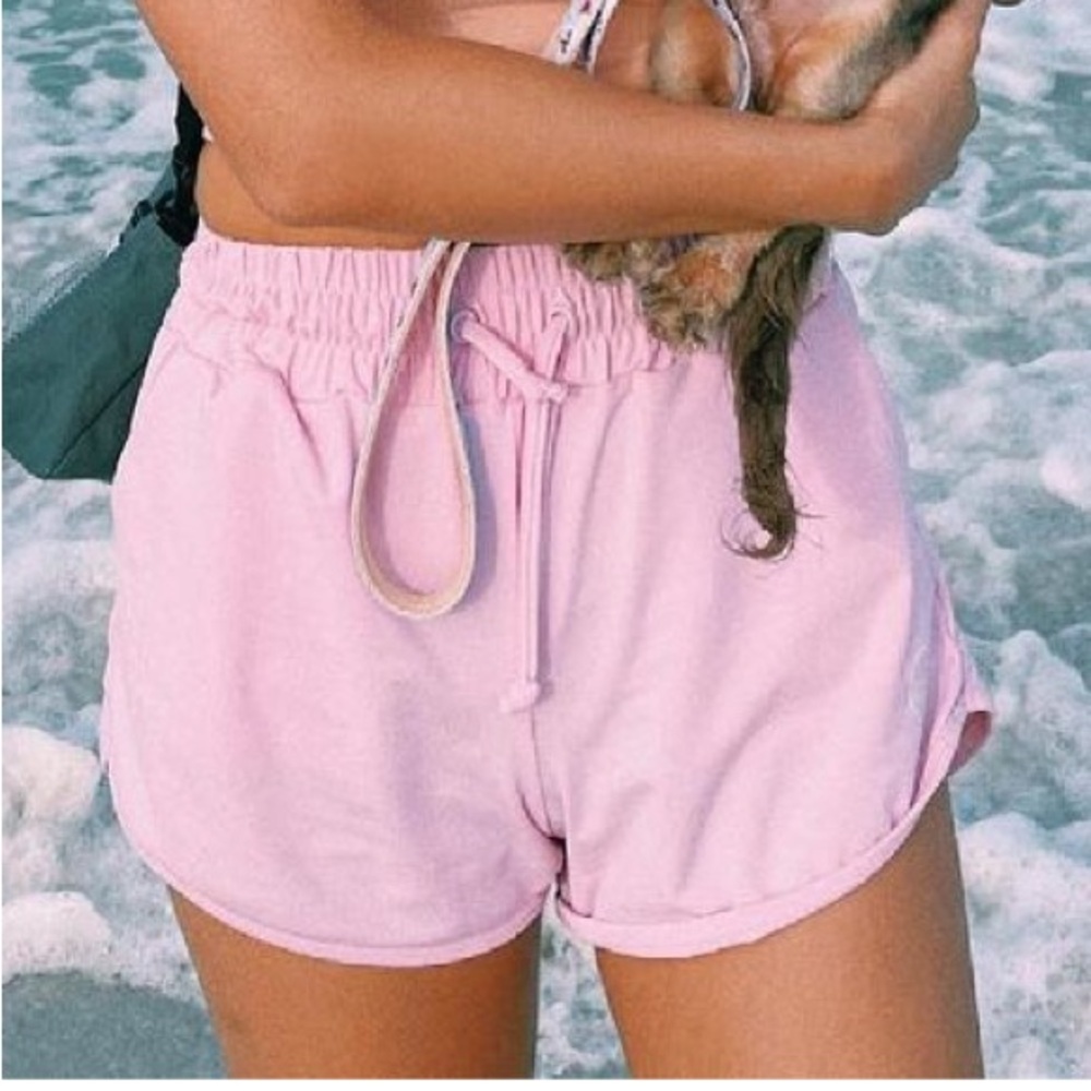 Four thirteen pink athletic shorts